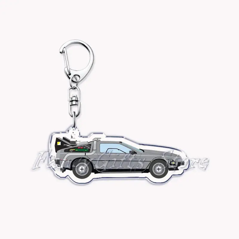 Silver acrylic Nissan Skyline car keychain featuring a detailed side profile of the DeLorean time machine from Back to the Future.
