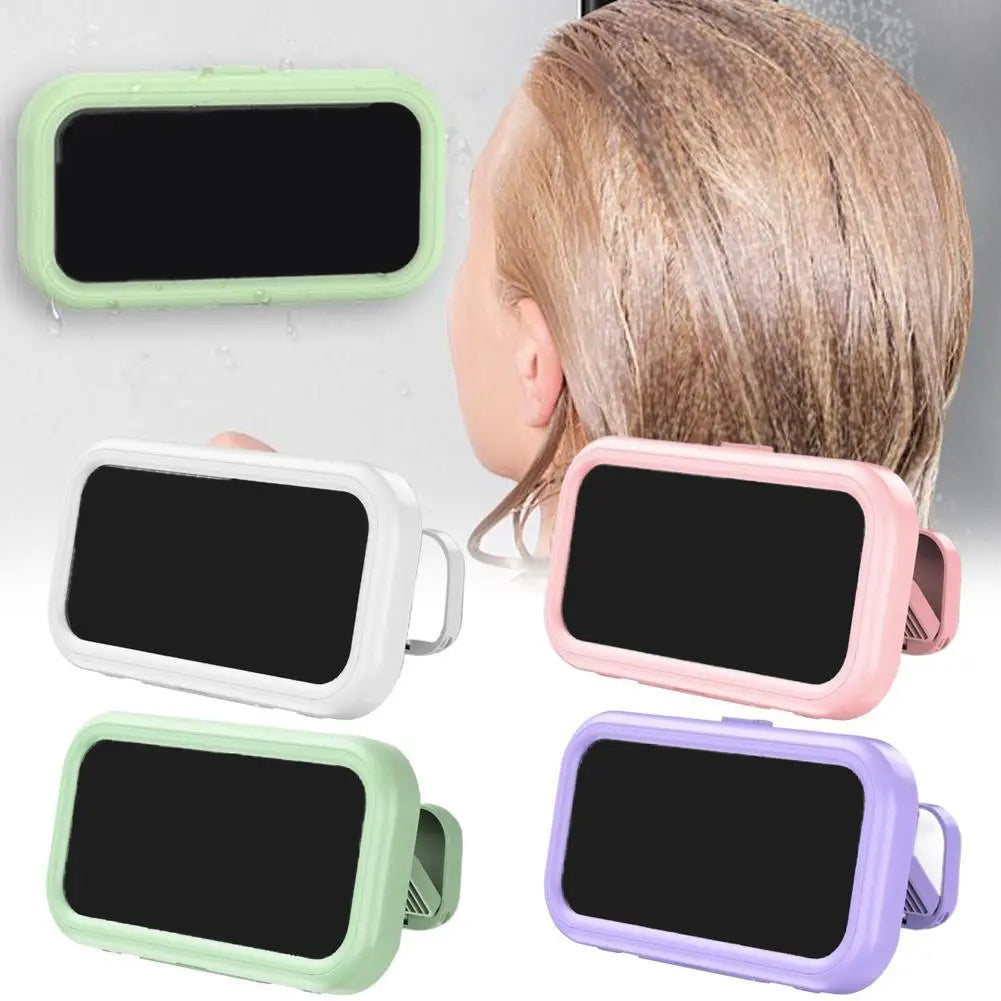 Pastel-colored rectangular bathroom mirror with a black reflective surface and rounded edges featured as part of a waterproof case 360 degree rotating shower phone holder.