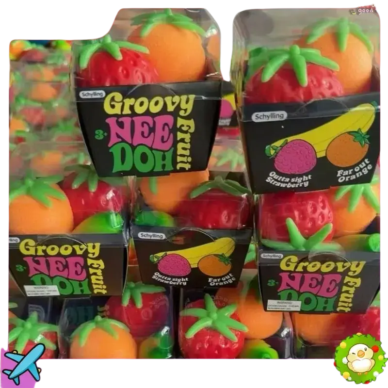 Front view of three vibrant red and orange squishy stress relief toys shaped like strawberries and oranges with green stems