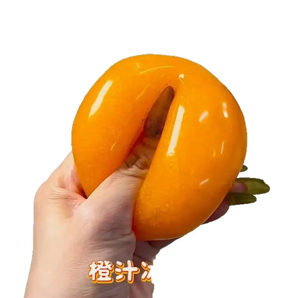 Vibrant orange slushy squishy stress relief toy shaped like a glossy persimmon with a small stem viewed from the front.
