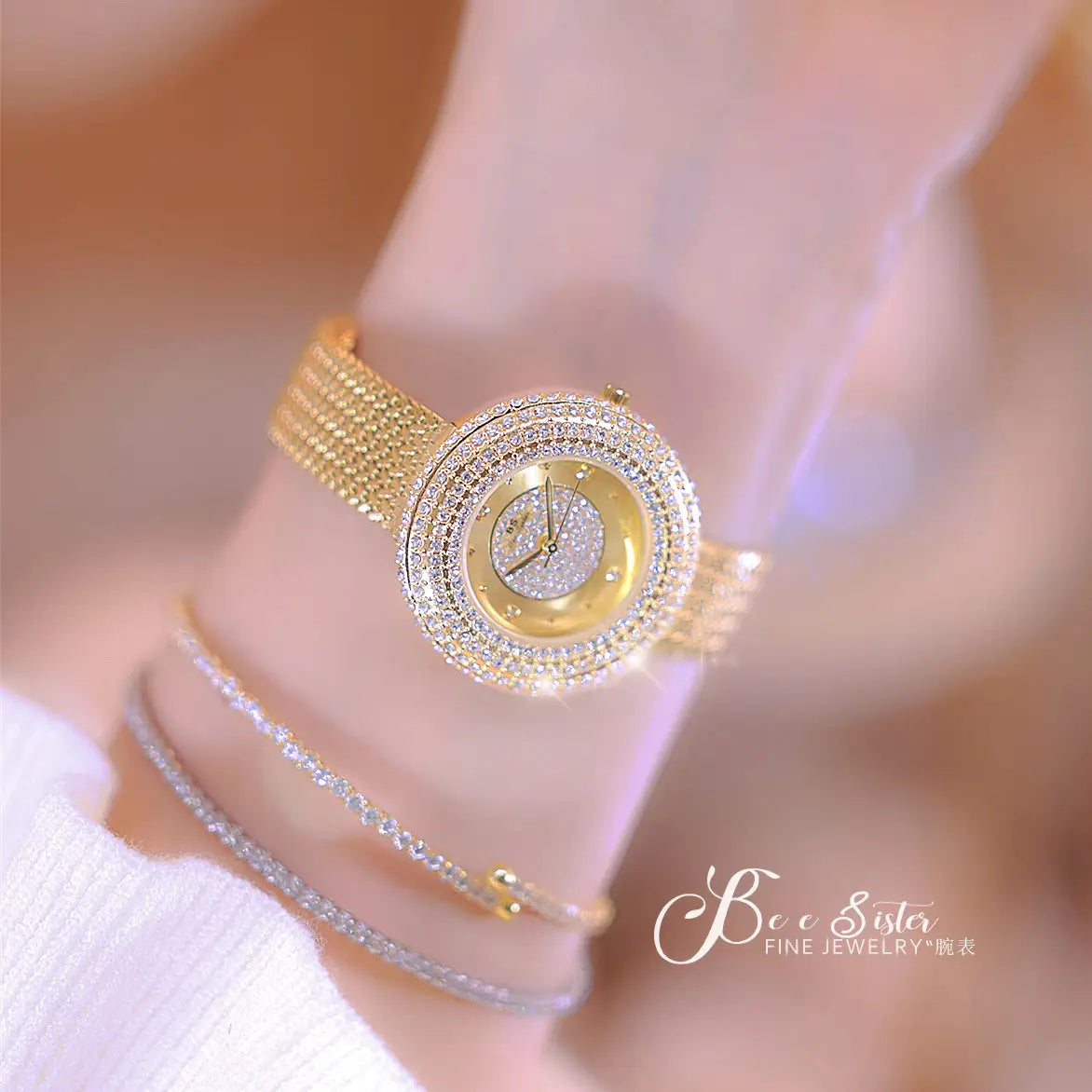 Gold-toned luxury women watch with diamond-encrusted sparkling crystal dial and mesh band designed to be waterproof.