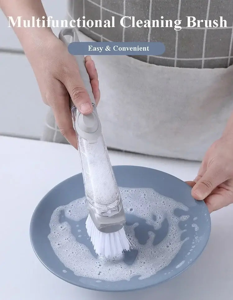 Brosse à vaisselle pour distribution de savon avec manche gris long, corps en plastique transparent et brins blancs, conçue pour un lavage de la vaisselle aisé et pratique.