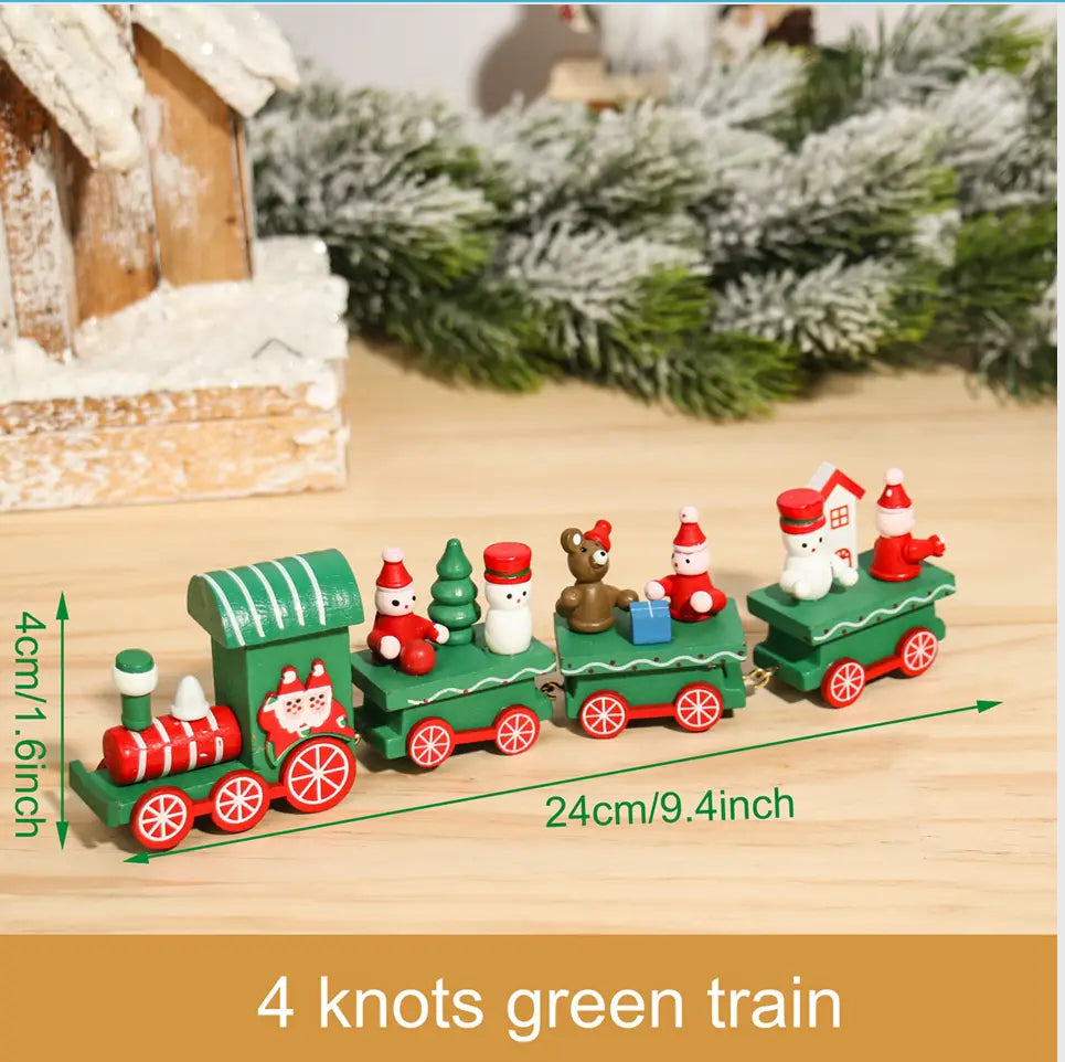 A festive miniature green and red wooden Christmas train toy with four carriages featuring santa claus snowmen and bears for holiday home decoration.