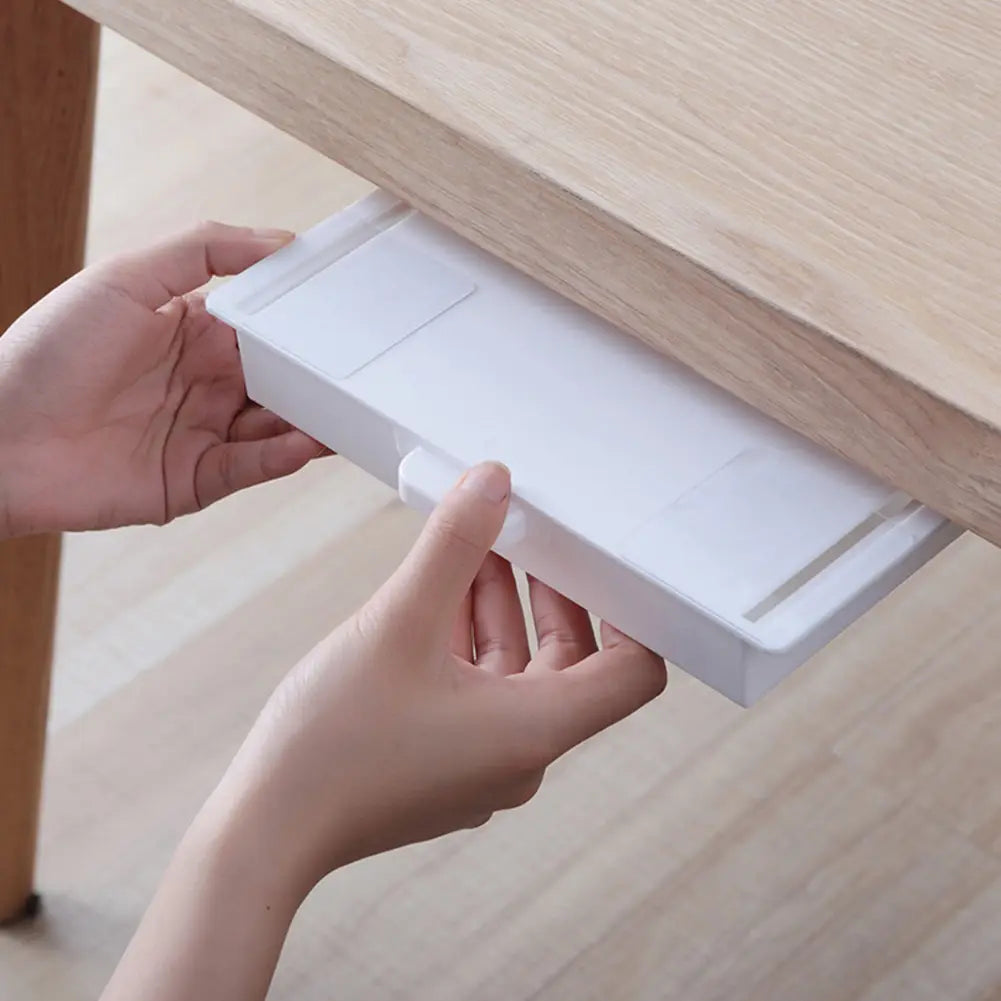 Organisateur de tiroir sous bureau en plastique blanc avec poignée de traction et compartiments internes en ABS, pour un stockage et une organisation efficaces.