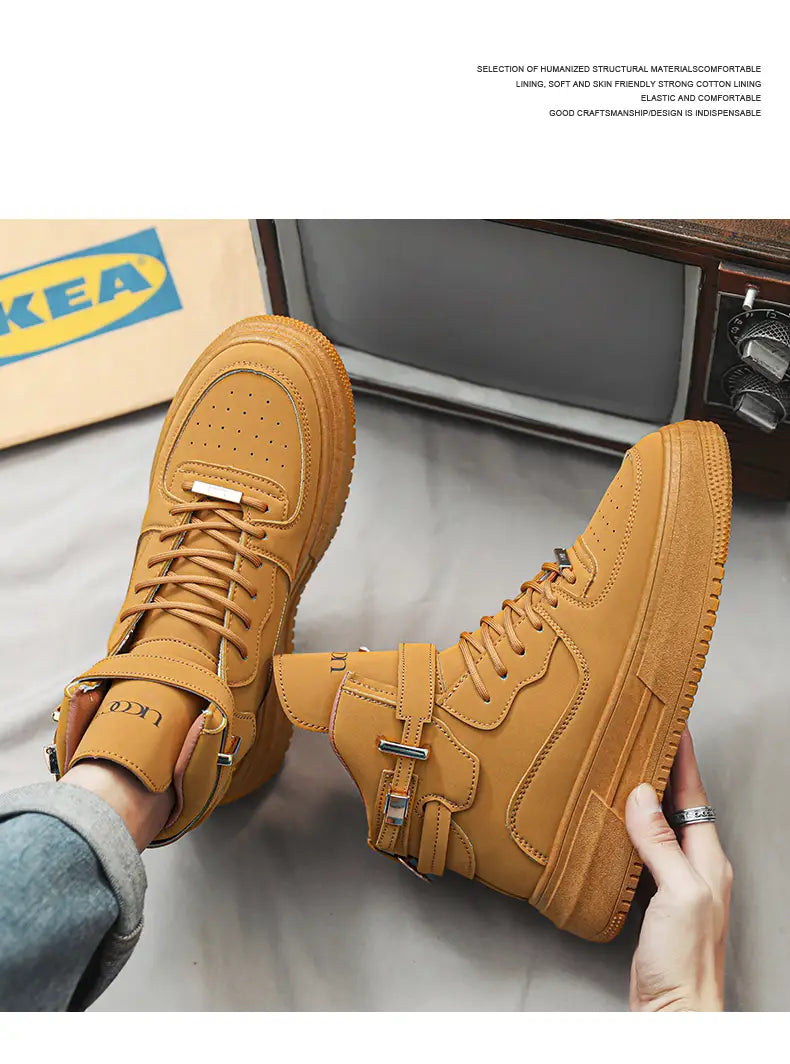 Men white high top sneakers with tan suede and canvas upper featuring chunky gold buckle accents on side straps.