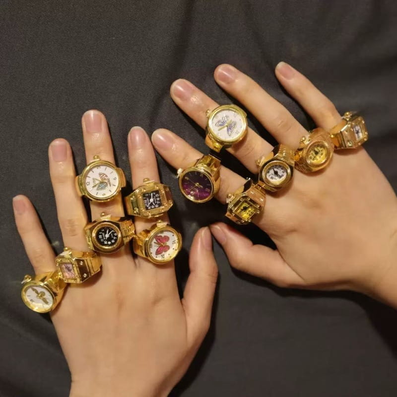 gold butterfly watch rings feature various face designs and colors in stainless steel with a cute jewelry style and a gold finish.