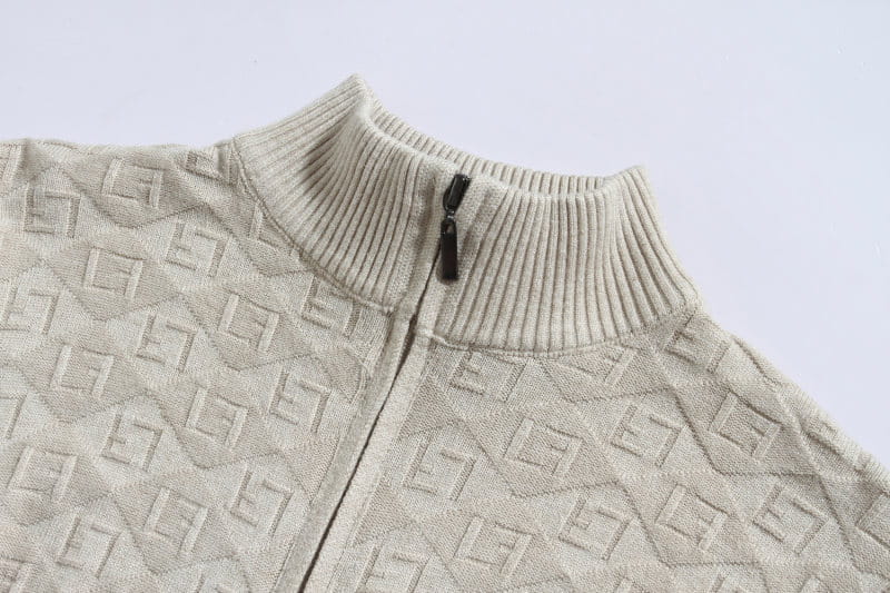 Plus size mens beige knit zip-up sweater with a repeating geometric pattern and ribbed collar.