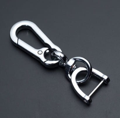 Silver-toned metal anti-lost stainless steel car key ring pendant with a polished finish and attached d-ring for secure key organization.