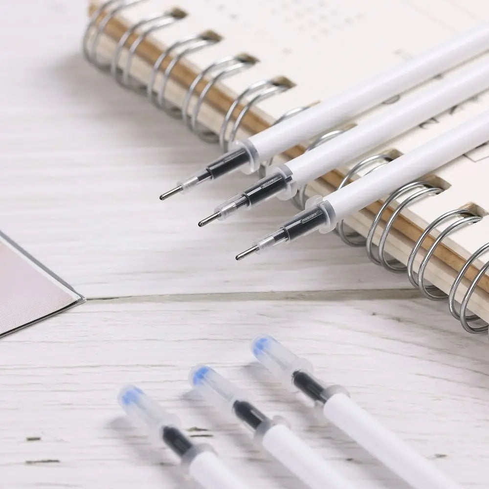 10PCS/Lot School Writing Supplies Office Black Ink White Color Shell Gel Pen Refills Medium Nib Core