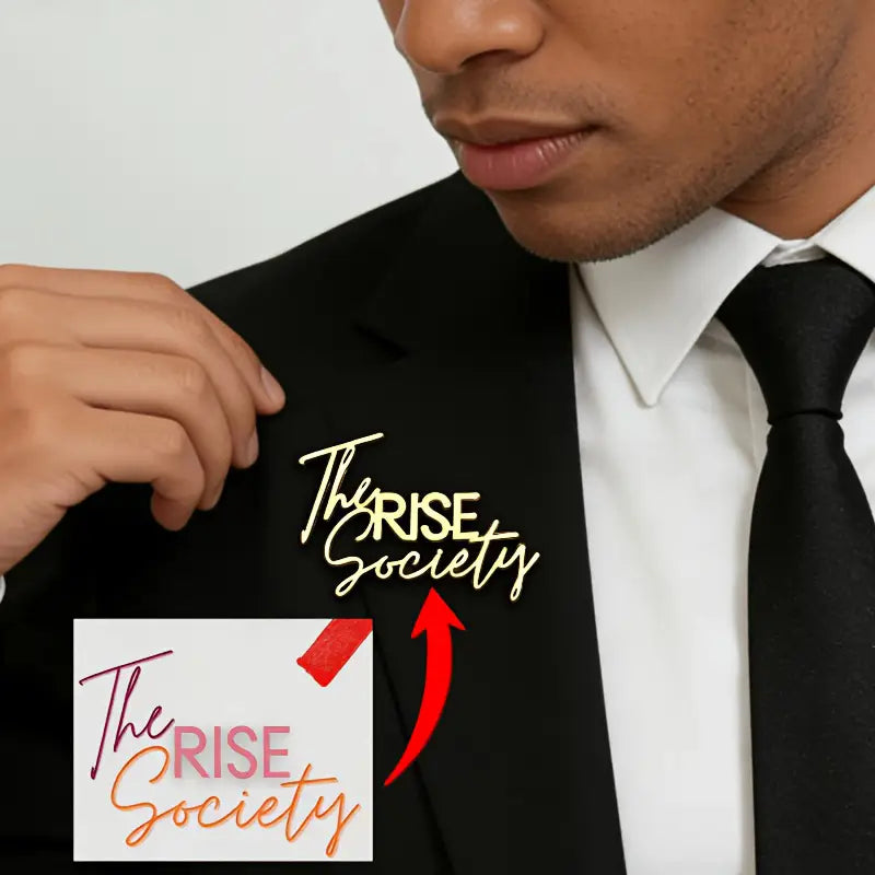 Gold-colored metallic custom signature logo brooch metal pin engraved with the rise society in cursive and block font design.