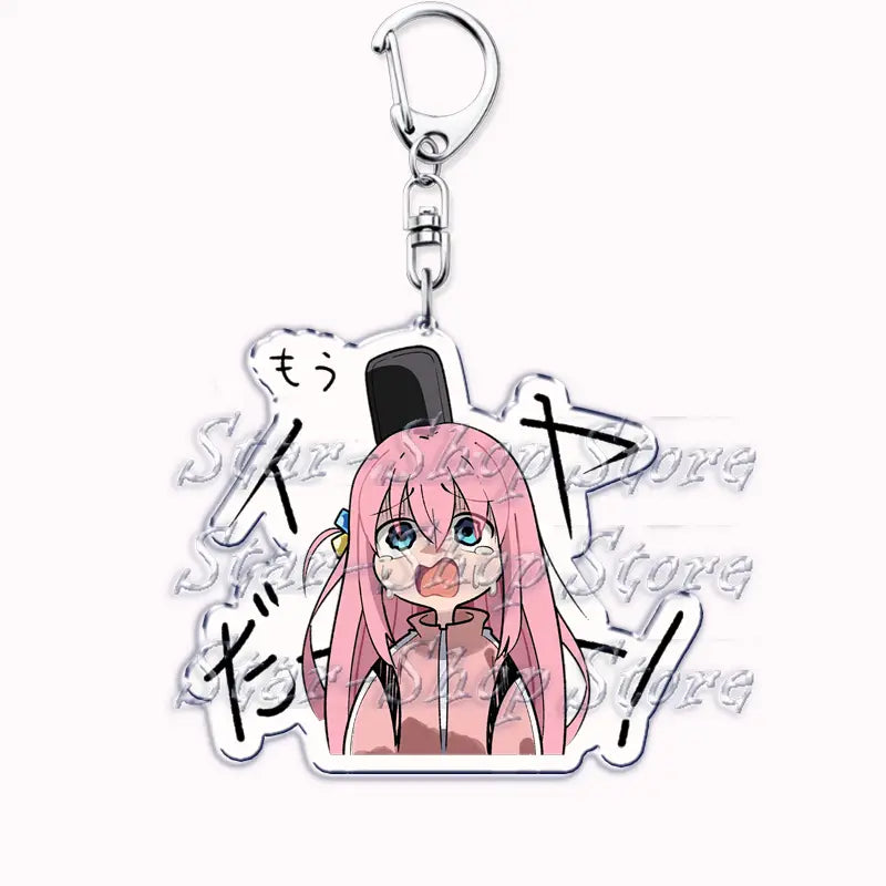Pink-haired anime character acrylic keychain from Bocchi the Rock featuring a black top hat and silver metal clip.