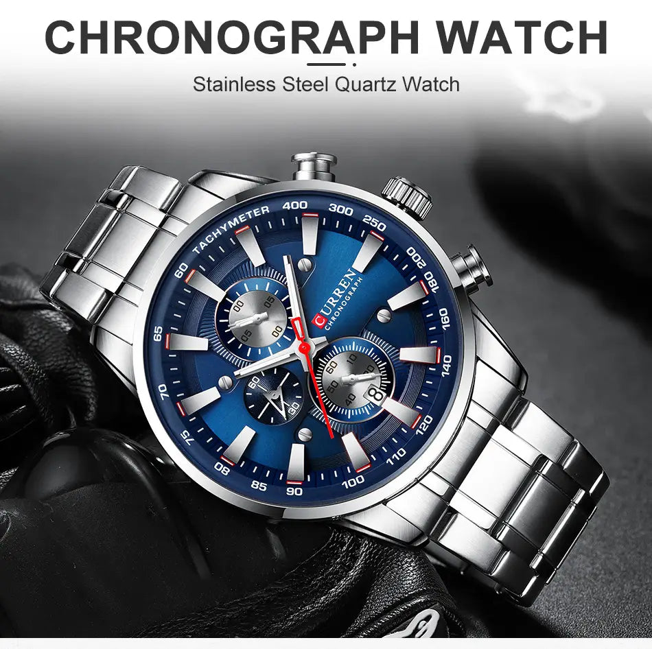 Silver stainless steel Curren mens chronograph watch with a vibrant blue dial featuring three sub-dials and red-tipped hands.