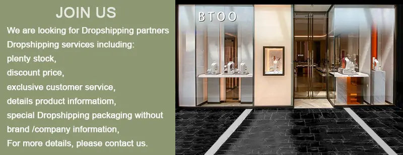 The storefront of btoo showcases sleek glass windows with elegant jewelry on minimalist white pedestals alongside a leather hole punch beading awl with a wood handle and steel tool.