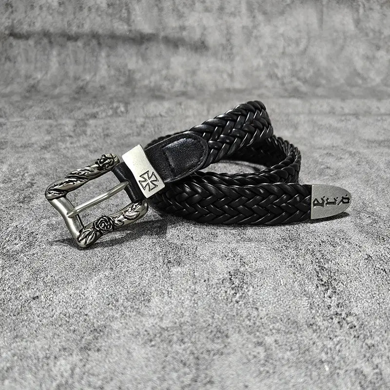Black braided leather fashion belt male with a silver-toned buckle featuring rose engraving and an engraved metal plate, embodying luxury designer punk and belt male cross style.