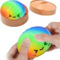 Front view of a rainbow-colored dumpling squishy with a smiling face designed as a sensory stress relief toy