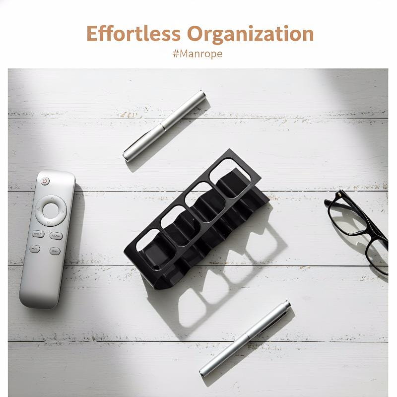 Black plastic remote control organizer desktop storage rack with rectangular slots for efficient device arrangement.