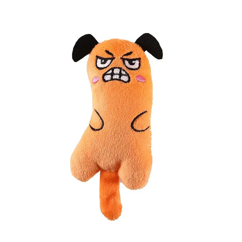 黒い耳に刺しゅうで怒った表情をあしらい、ピンクのほおを備えたオレンジのぬいぐるみ犬のおもちゃ。キャットニップを含む、子猫が噛むためのインタラクティブな動物おもちゃタイプとして設計されています。