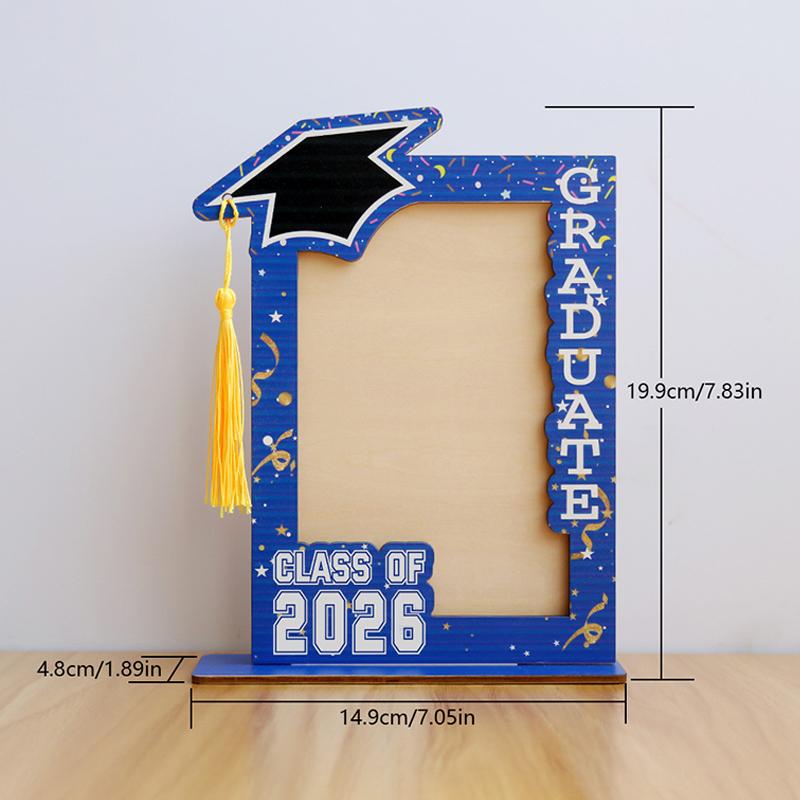 Blue wooden graduation photo frame featuring a black mortarboard with a yellow tassel and white graduate and class of 2026 lettering for class of 2026 celebrations.