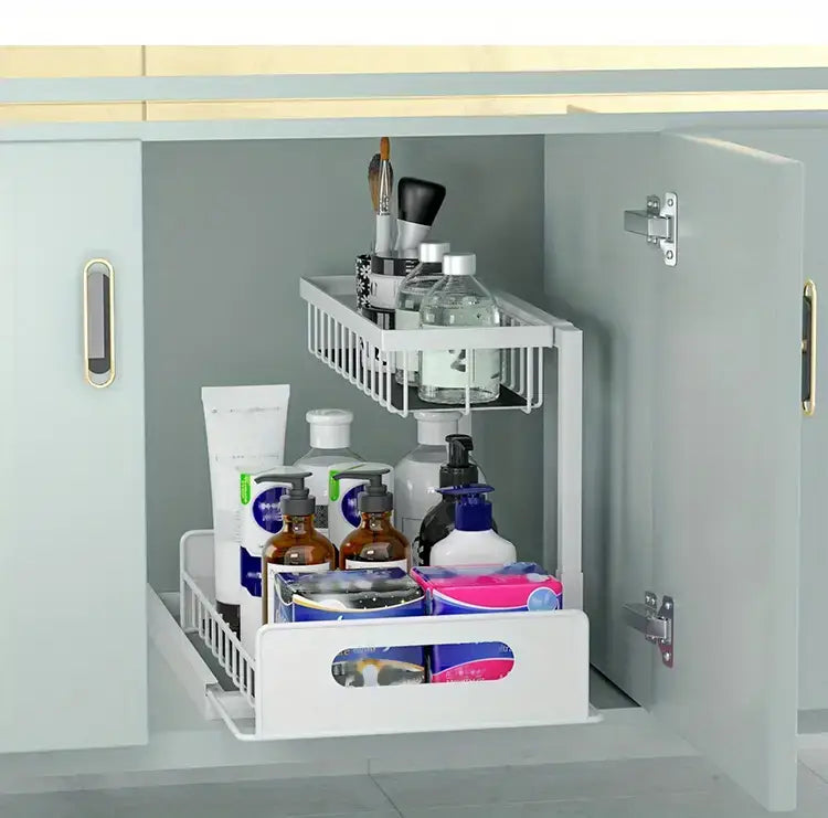 Organisateur d’évier à deux niveaux en treillis métallique blanc, conçu pour les placards de cuisine et de salle de bains, présentant un design en forme de L pour un rangement optimisé.