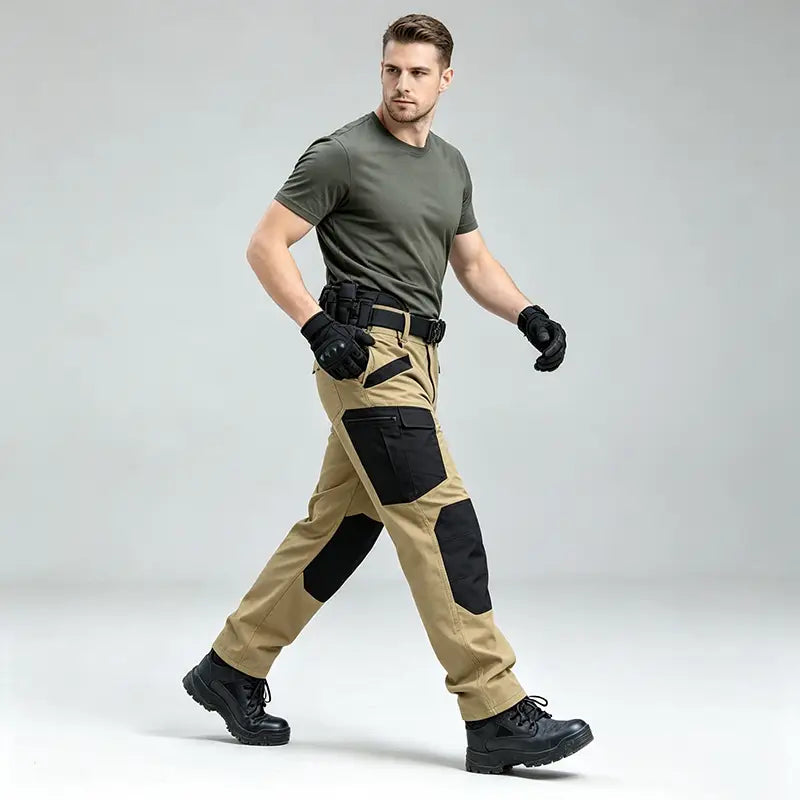 Men winter tactical cargo pants in tan with black reinforced knee and thigh patches featuring multiple utility pockets designed for waterproof hiking trousers.