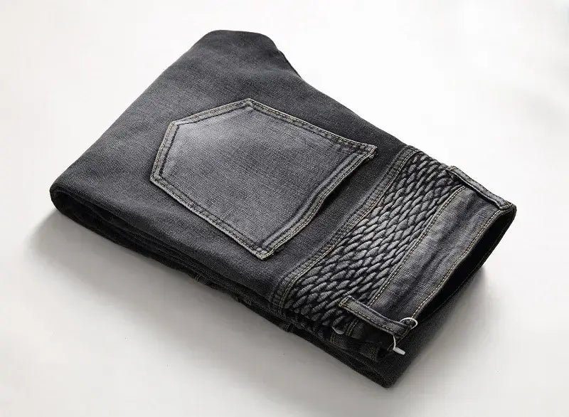 Jeans de moto pour hommes, coupe slim délavée, en denim gris foncé, avec un panneau tissé texturé sur la couture latérale.