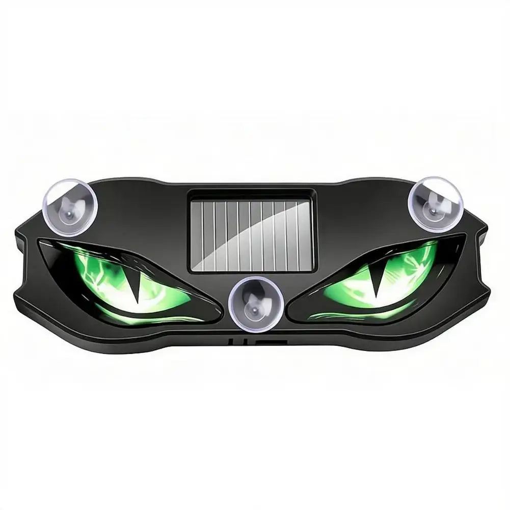 autocollant solaire d’avertissement pour pare-brise de voiture en plastique noir avec ventouses, avec un motif d’œil de démon vert lumineux et un panneau solaire au centre