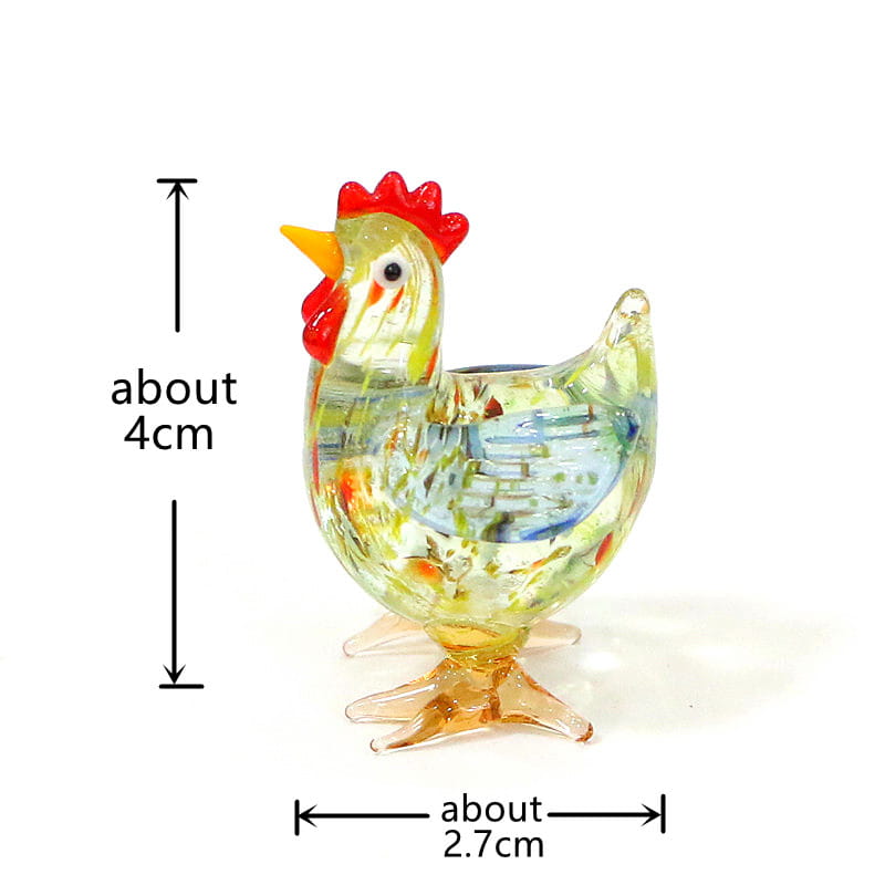A vibrant hand-blown glass rooster miniature figurine with a red comb yellow beak and translucent green blue and orange swirls designed as an Easter ornament.