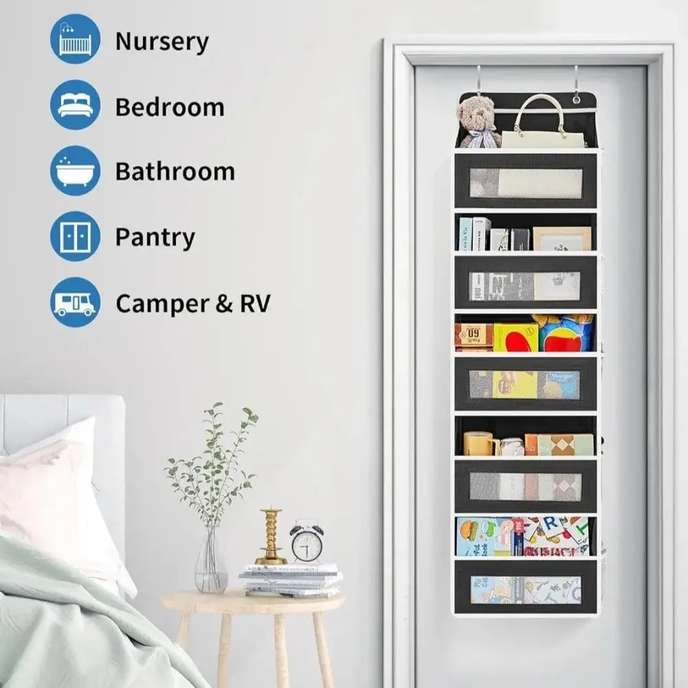 Black and white gray over door hanging storage organizer with five pockets and clear plastic inserts for multi-compartment storage.