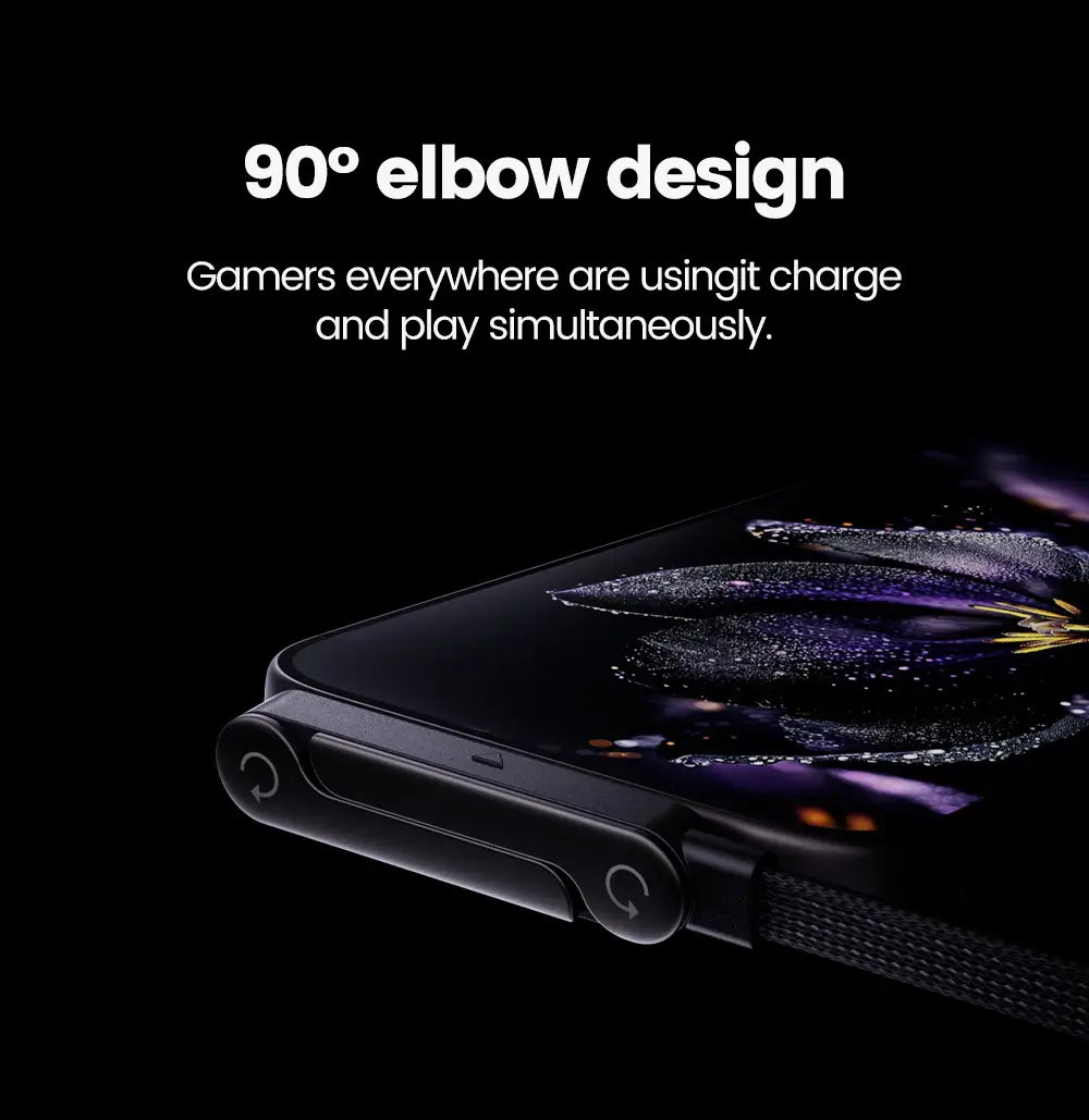 Black Samsung Galaxy Z Fold 4 with a sleek curved edge and integrated charging port displayed with a 65w USB C fast charging cable and phone holder for simultaneous gameplay.