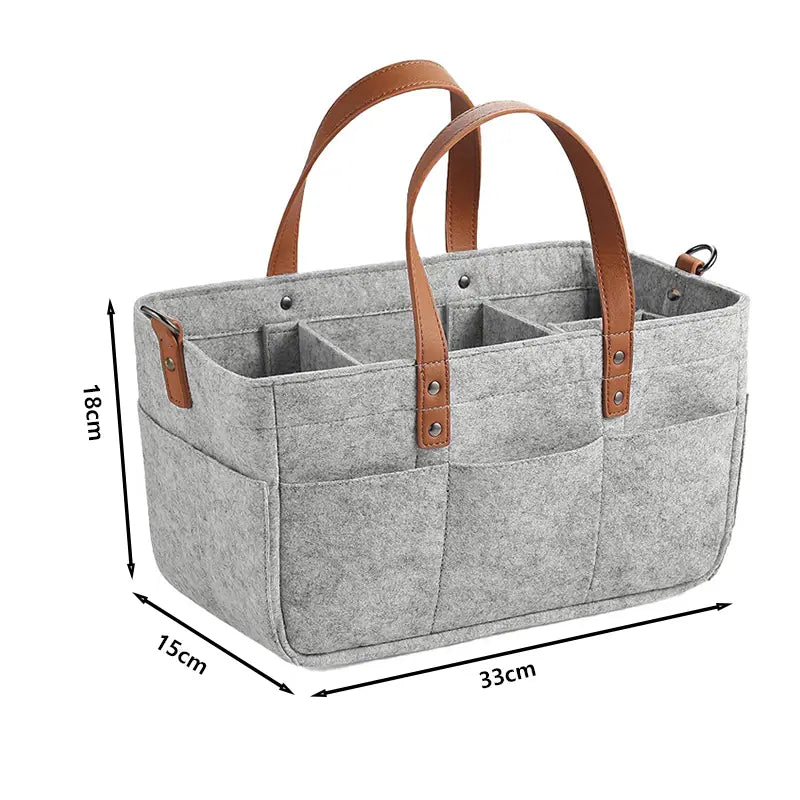 Organiseur de siège de voiture en feutre gris, sac de rangement, avec poignées en cuir marron et plusieurs compartiments pour un rangement et une organisation efficaces.
