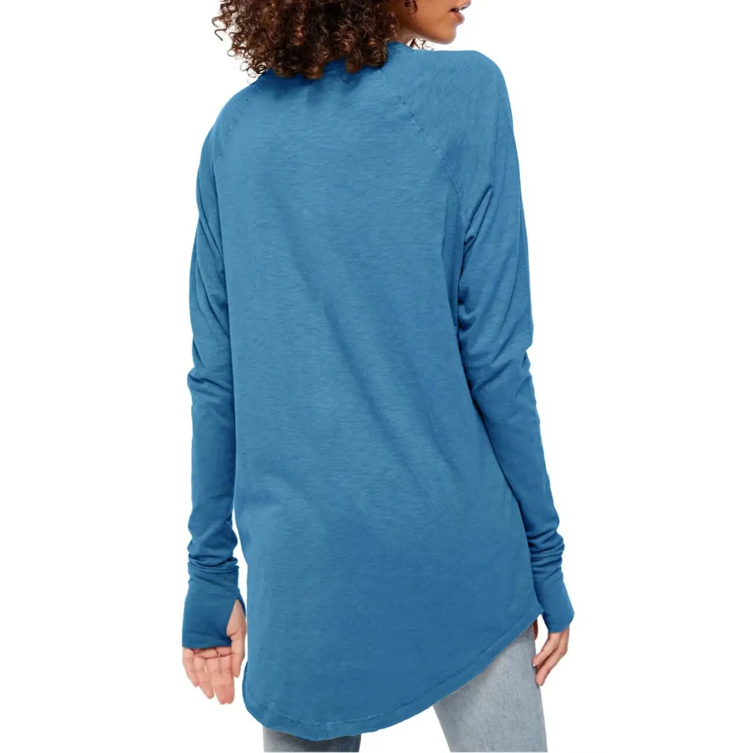 Women long sleeve cotton tunic top in soft teal with a relaxed fit and asymmetrical hemline featuring long sleeve sleeve length.