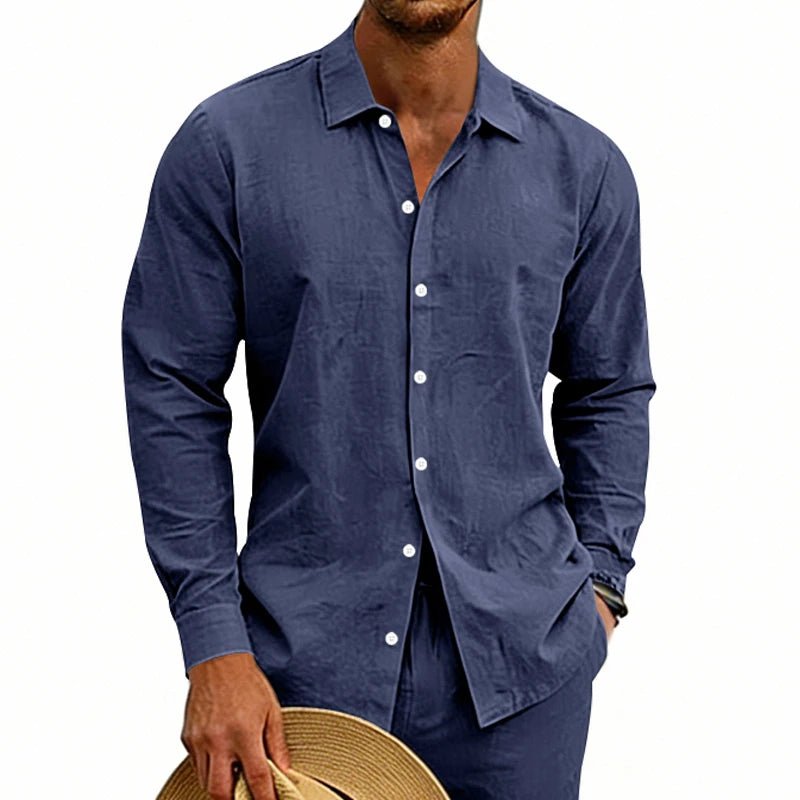 Men beige linen long sleeve casual shirt shown as a navy blue long-sleeved button-down with white buttons and subtle textured fabric.