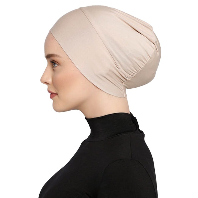 Beige stretchy jersey hijab cap and turban set made of soft fabric with flexible fit and gentle draping.