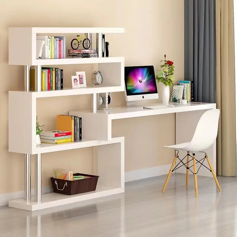 Modern l shaped computer desk in white with integrated shelving units and silver metal supports designed for efficient workspace organization.