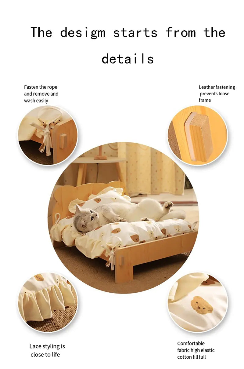A cozy cream-colored cat bed with soft ruffled edges and embroidered bear motifs designed for a wooden cat bed frame.