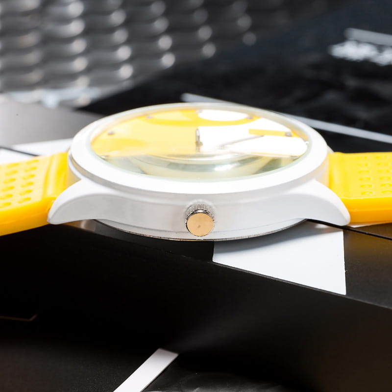 Womage silicone quartz women sports watch with a bright yellow silicone strap and a round white face featuring a cartoon character design.