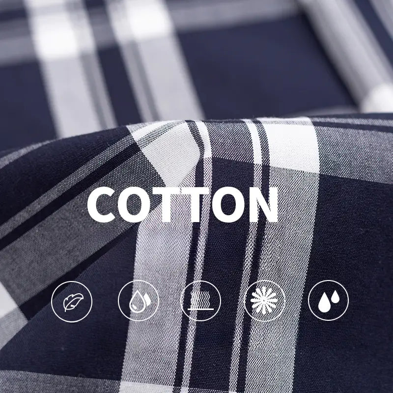 Men’s cotton plaid long sleeve slim fit shirt in dark blue and white with a soft textured weave.