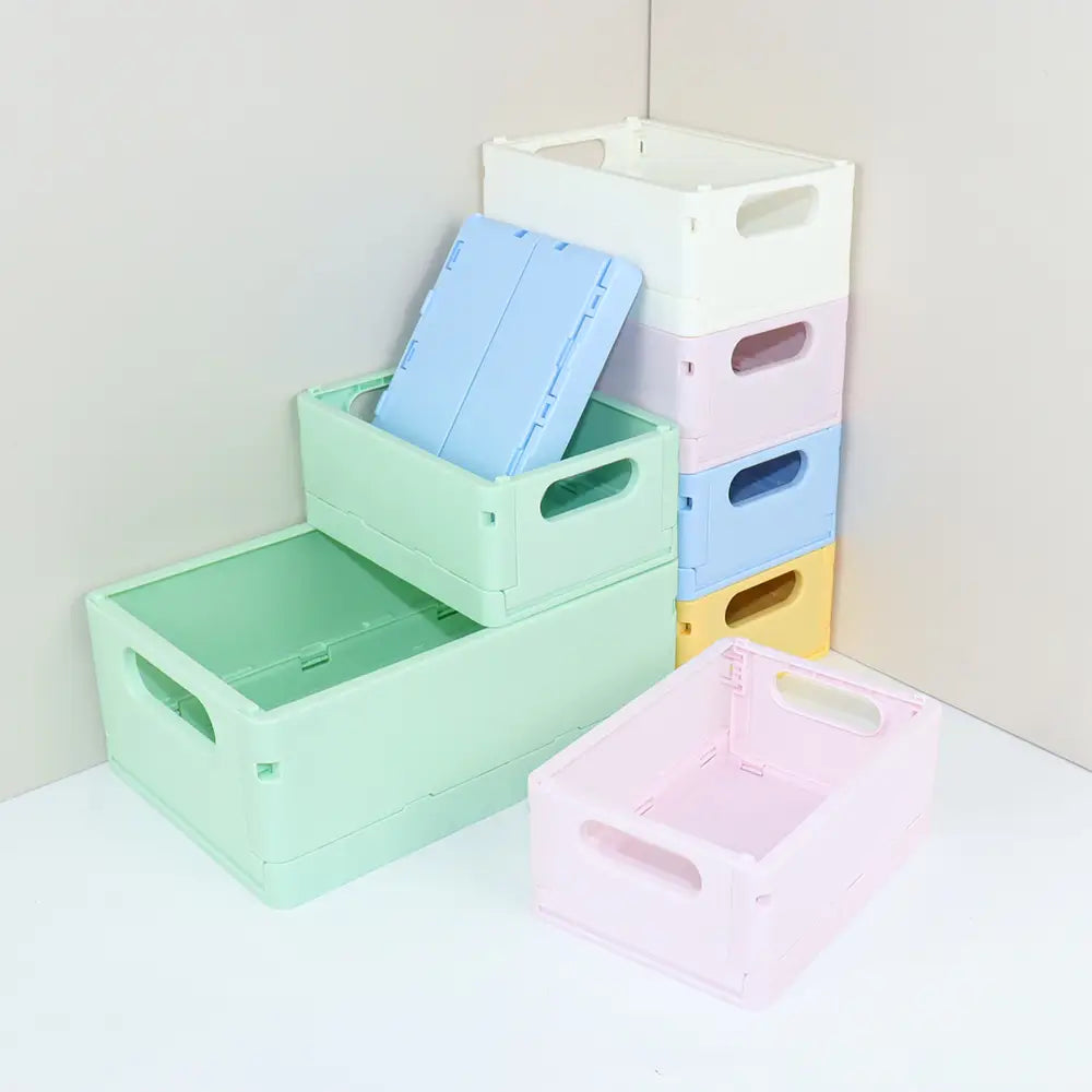 pastellfarbene Kunststoff-Falt-Aufbewahrungsboxen in mintgrün, hellblau, rosa und gelb, ausgelegt als Desktop-Organizer für die vielseitige Verwendung von Aufbewahrungsboxen-Körbchen