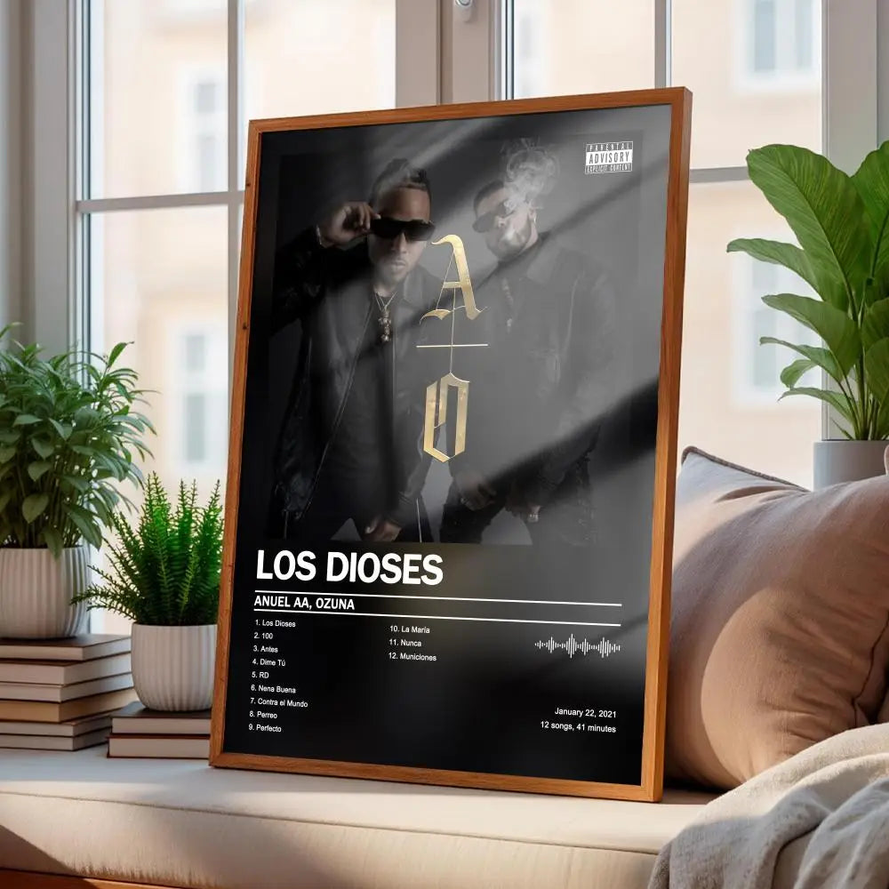 A framed black-and-white wall art print with gold lettering and a parental advisory label featuring the los dioses album cover by Anuel Aa and Ozuna, suitable for art home decor in mainland China.