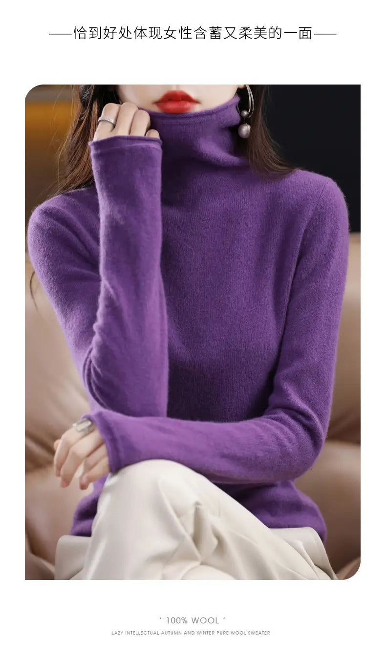 A rich purple merino wool turtleneck sweater for women featuring a soft ribbed texture and long sleeves.