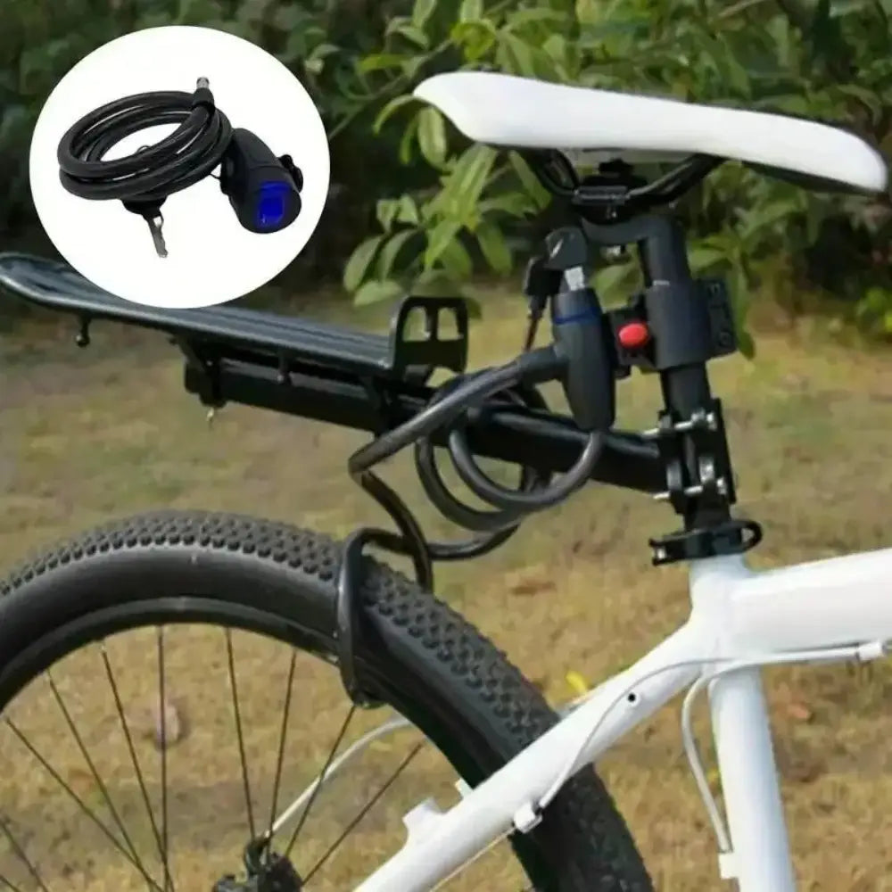 Black coiled heavy duty motorcycle chain lock with a blue-lit digital display and key attachment for anti theft bike security.