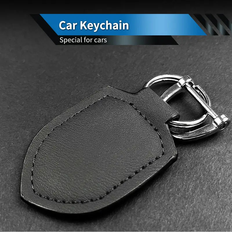 Black leather Shield leather car keychain ring organizer with silver metal ring and buckle.