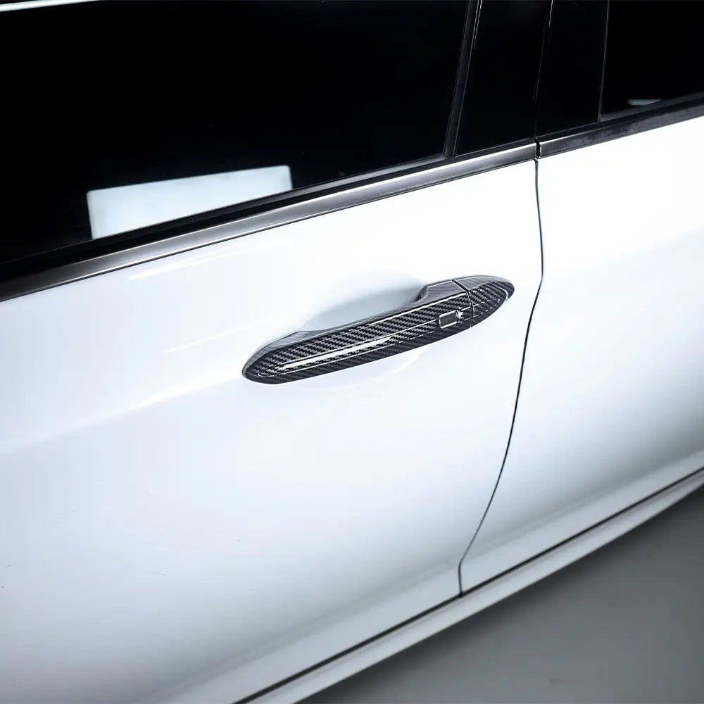 Garniture de protection de poignée de porte en ABS texturé aspect fibre de carbone noir pour la Genesis G80, composée de 8 pièces.