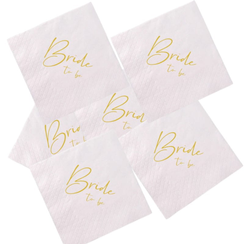 servilletas de papel blancas con la novia en metalizado en oro, impresas con tipografía tipo guion en cada una, paquete de 50 para uso en bodas