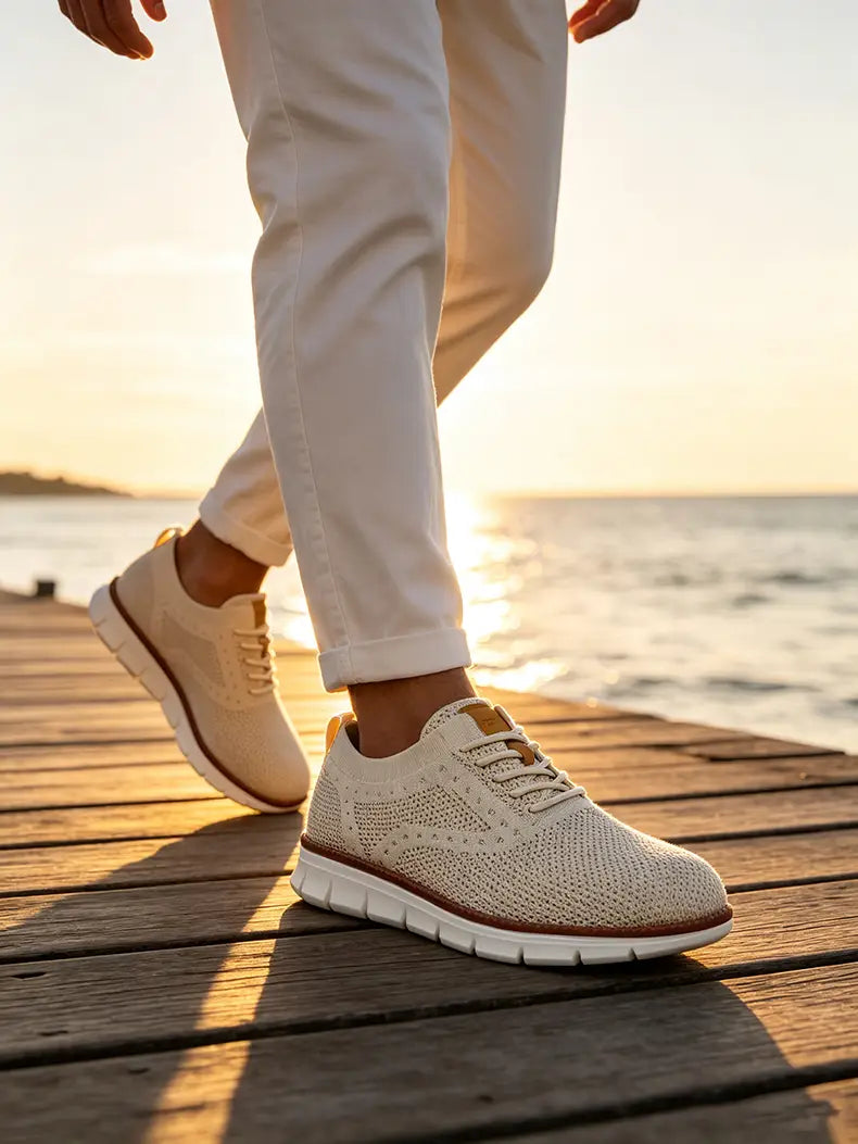 Zapatillas casual de punto para hombre Cole Haan modelo All Day en color crema con material transpirable, suela de goma blanca y acentos camel para zapatos de caminar.