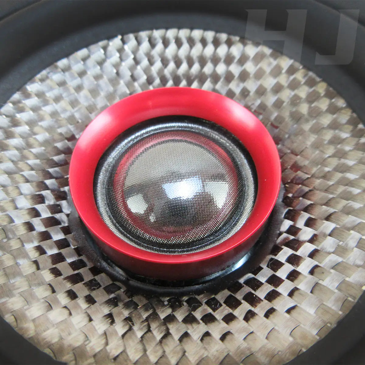 red circular 3.5 inch car coaxial speaker cone with metallic mesh grille and black surround against woven fabric background for 200w qp353f model