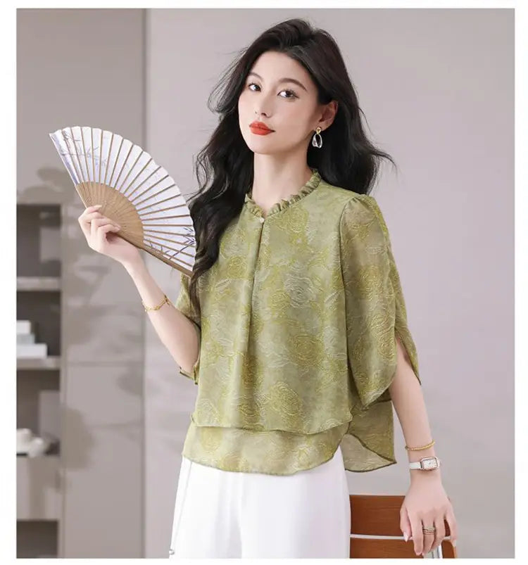 A delicate olive green chiffon ruffle short sleeve blouse for women casual top with a subtle floral pattern, sheer batwing sleeves, and ruffled neckline, ideal for size shoulder chest length measurements.