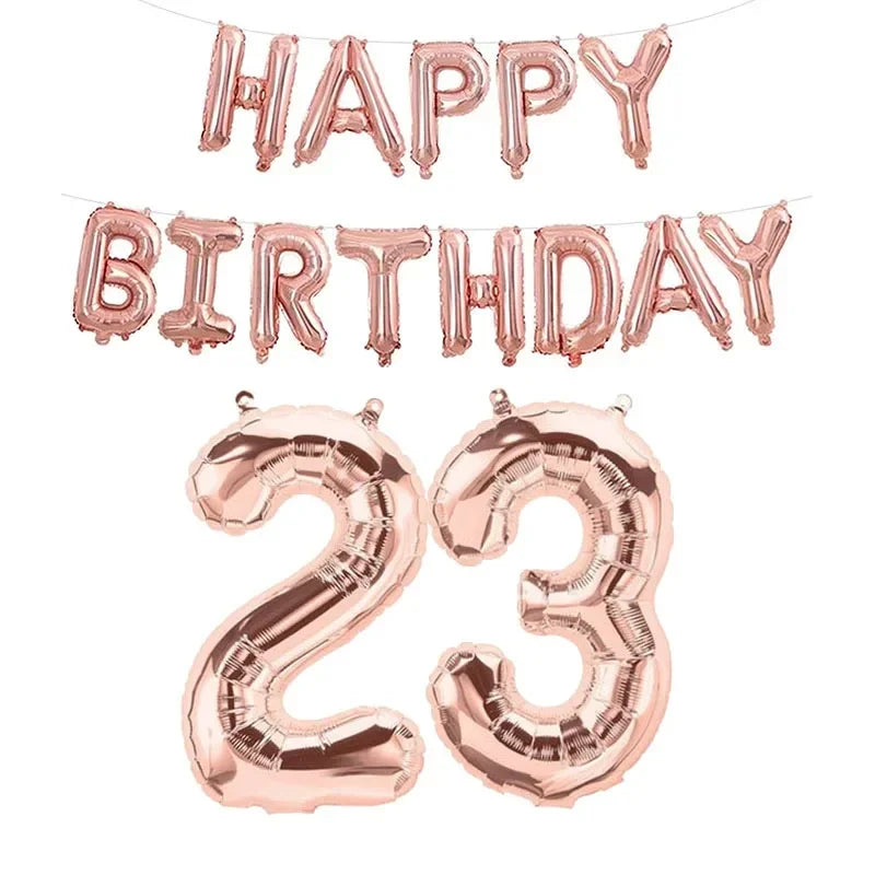 Ensemble de ballons en feuille or rose comprenant une banderole « Joyeux anniversaire » et le numéro 23 pour les célébrations d’anniversaire.