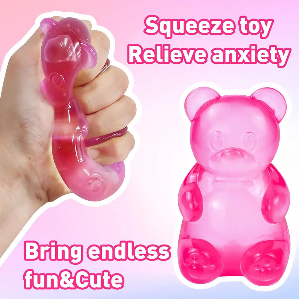 Pink translucent gummy bear sensory fidget toy made of soft squeezable material for stress relief and tactile stimulation.