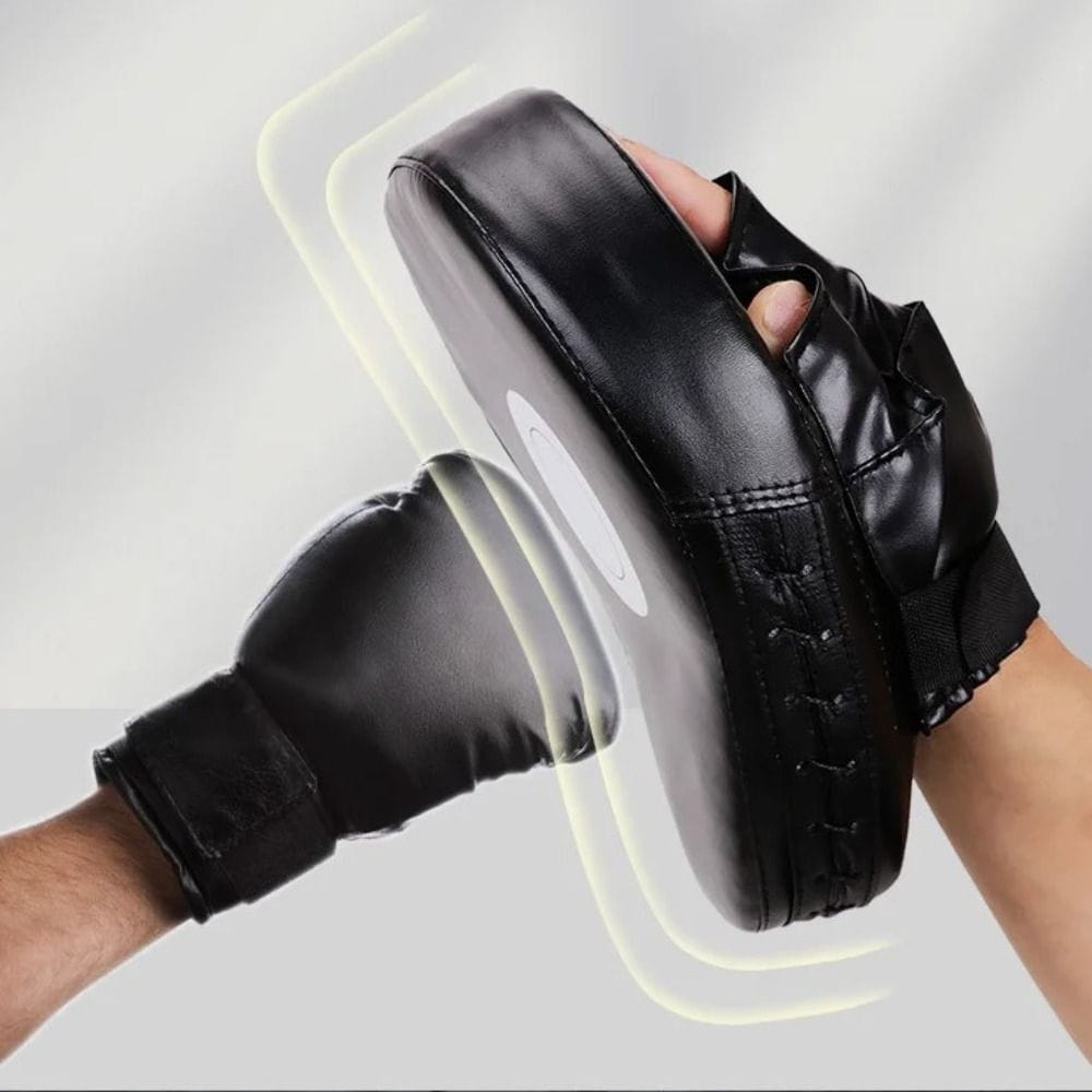 Black leather boxing punch pad focus mitt target with reinforced stitching and padded grip for fitness gear training.